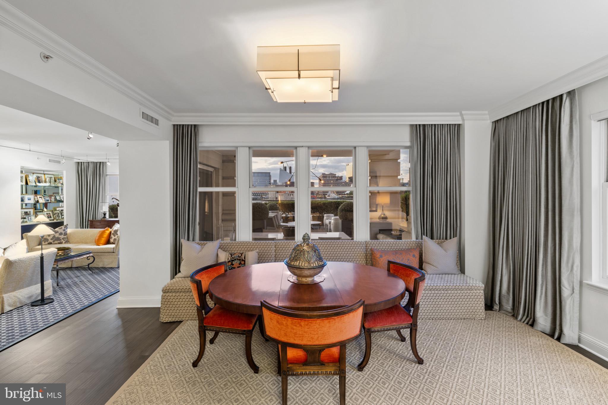 801 Key Highway, Unit 110 Baltimore, MD 21230 - Photo 24 of 78 a view of a dining room with furniture and window