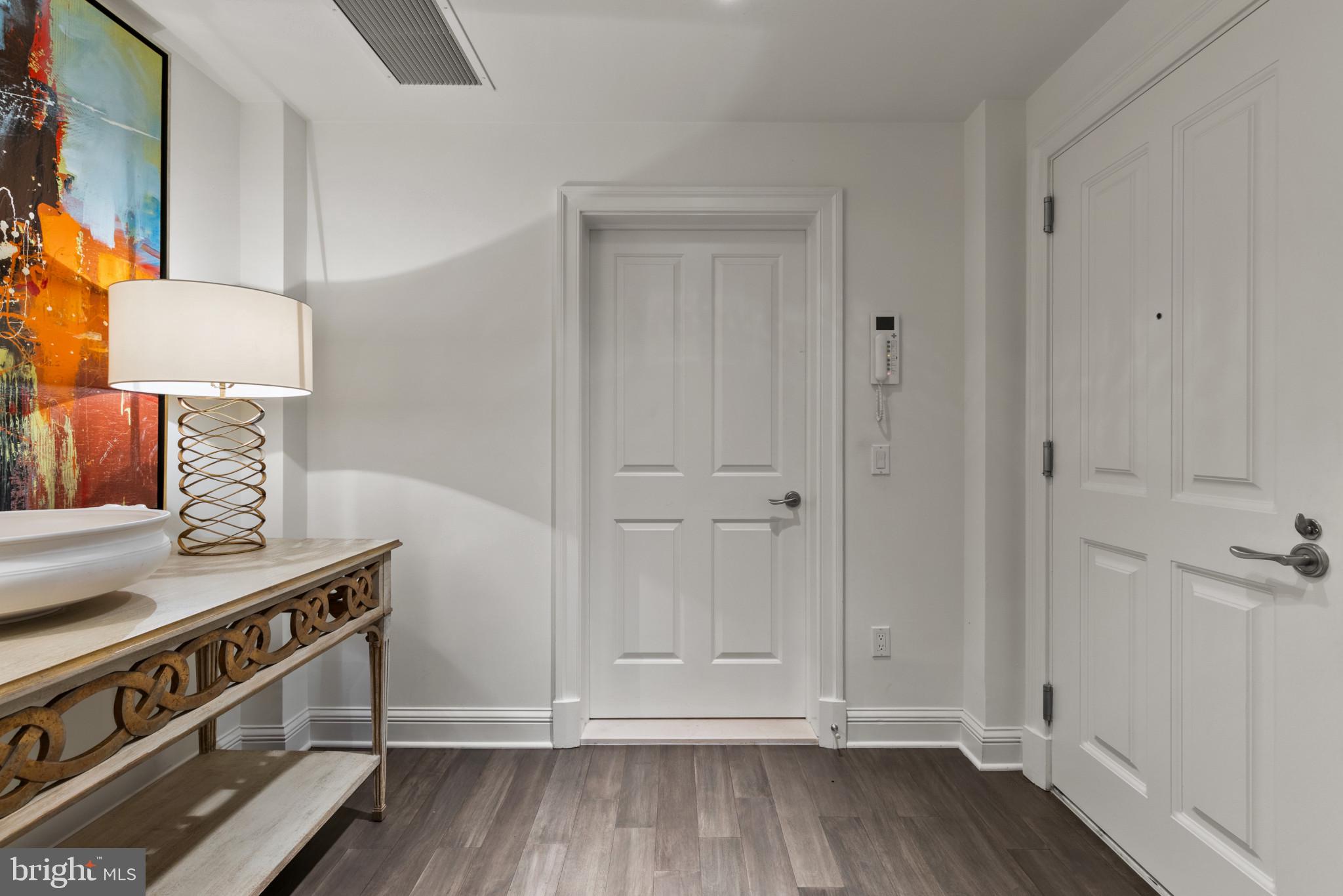 801 Key Highway, Unit 110 Baltimore, MD 21230 - Photo 3 of 78 a view of an entryway with wooden floor