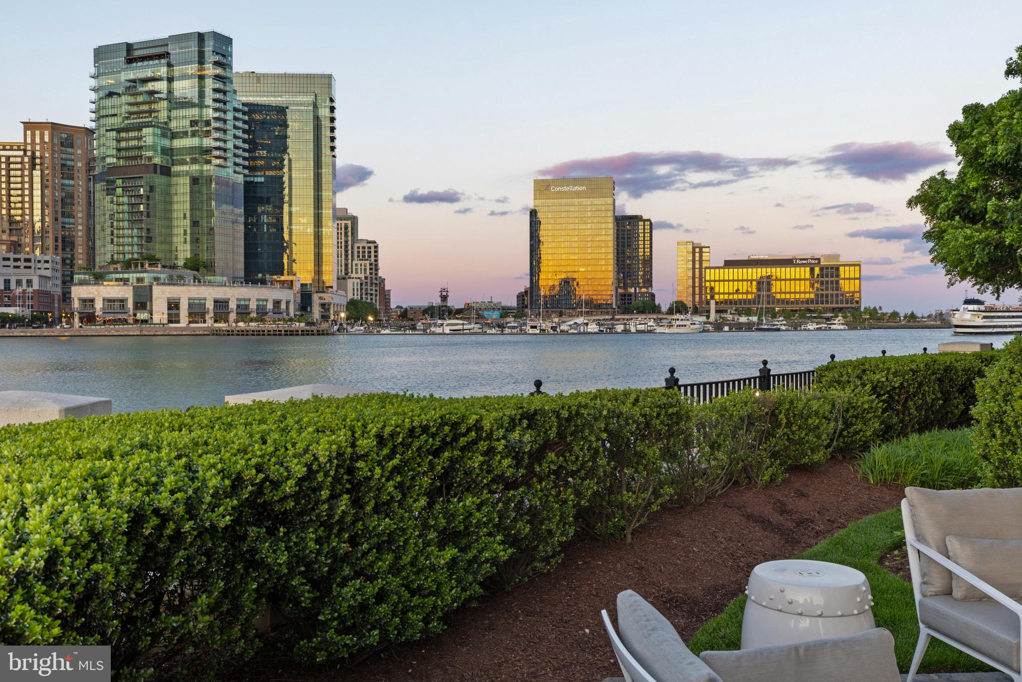 801 Key Highway, Unit 110 Baltimore, MD 21230 - Photo 62 of 78 a view of a city with tall buildings and a big yard