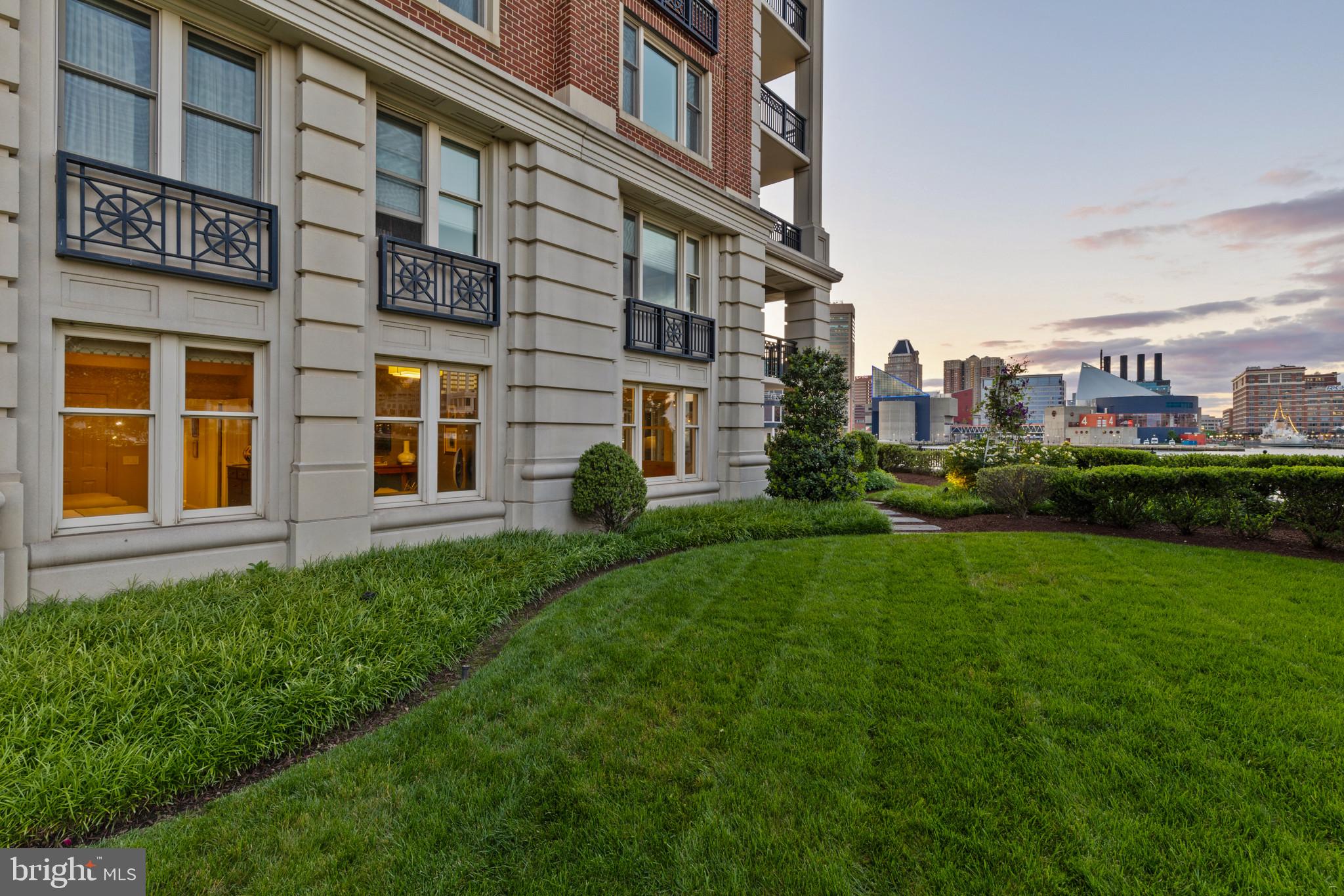 801 Key Highway, Unit 110 Baltimore, MD 21230 - Photo 63 of 78 a view of a building next to a big yard