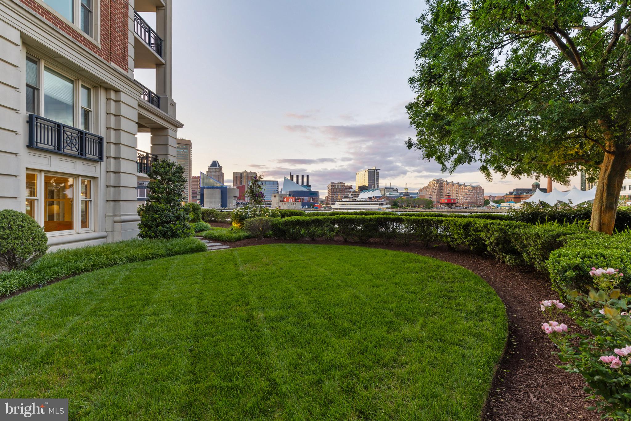 801 Key Highway, Unit 110 Baltimore, MD 21230 - Photo 64 of 78 a view of a big room with a big yard plants and large trees