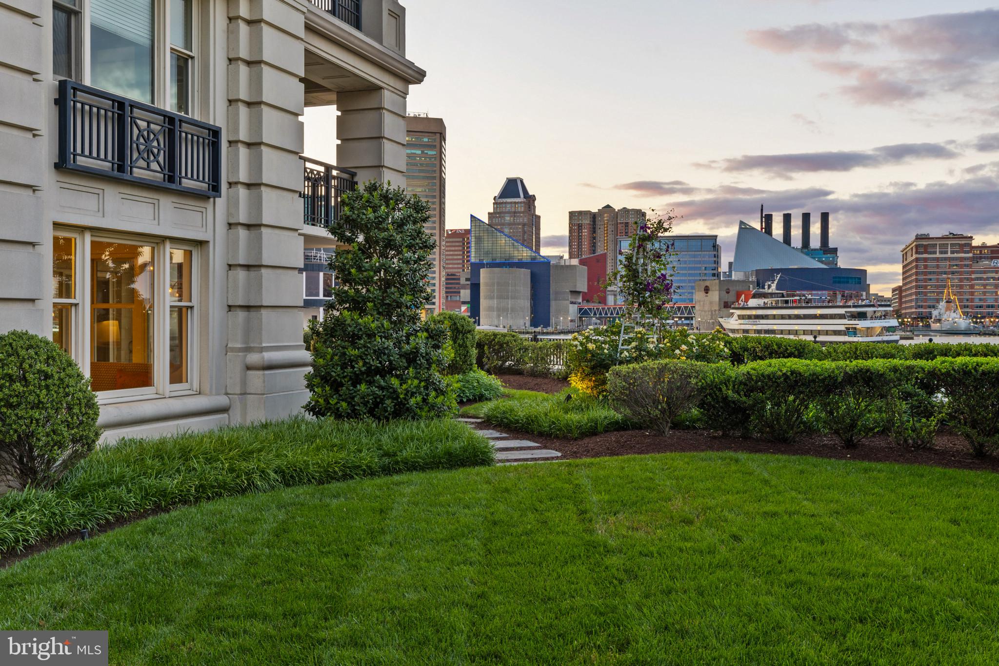 801 Key Highway, Unit 110 Baltimore, MD 21230 - Photo 65 of 78 a view of a city with tall buildings and a big yard