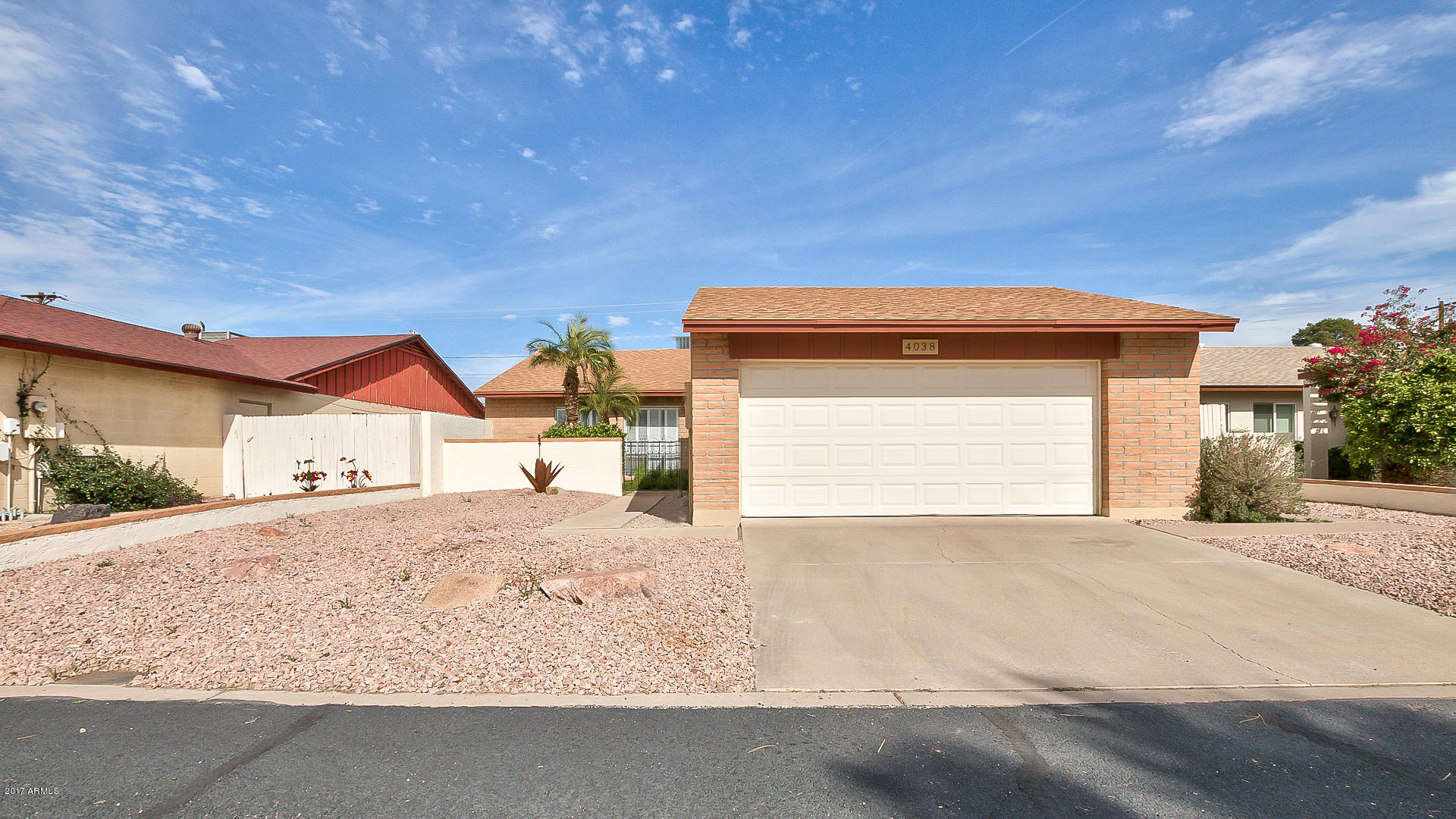 4038 West Griswold Road Phoenix, AZ 85051 - Photo 2 of 31 002_FRONT OF HOME