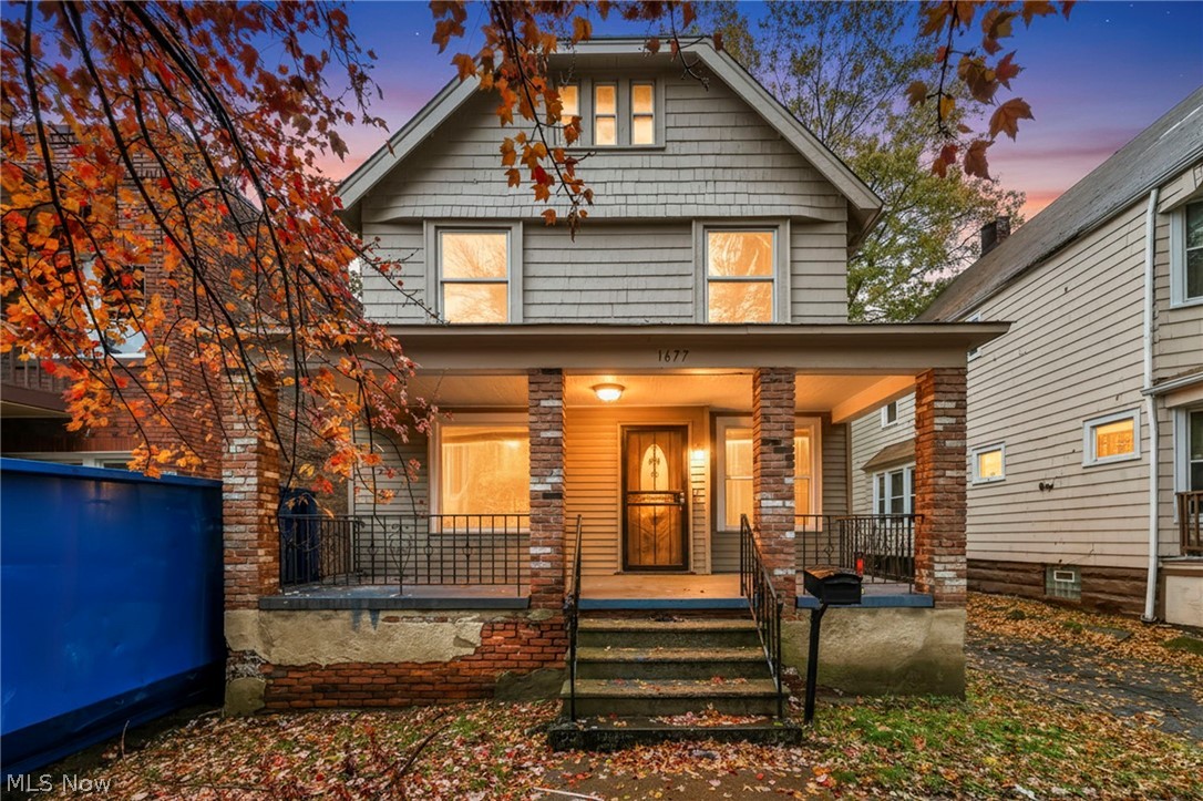Traditional style home with a porch