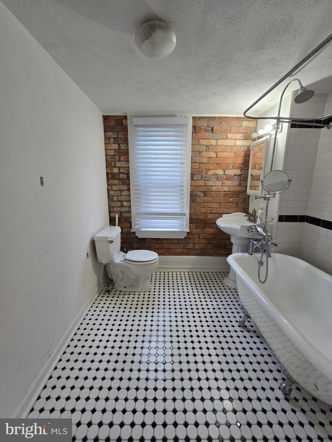 126 East 7th Street Frederick, MD 21701 - Photo 6 of 9 Charming bathroom with vintage flair.