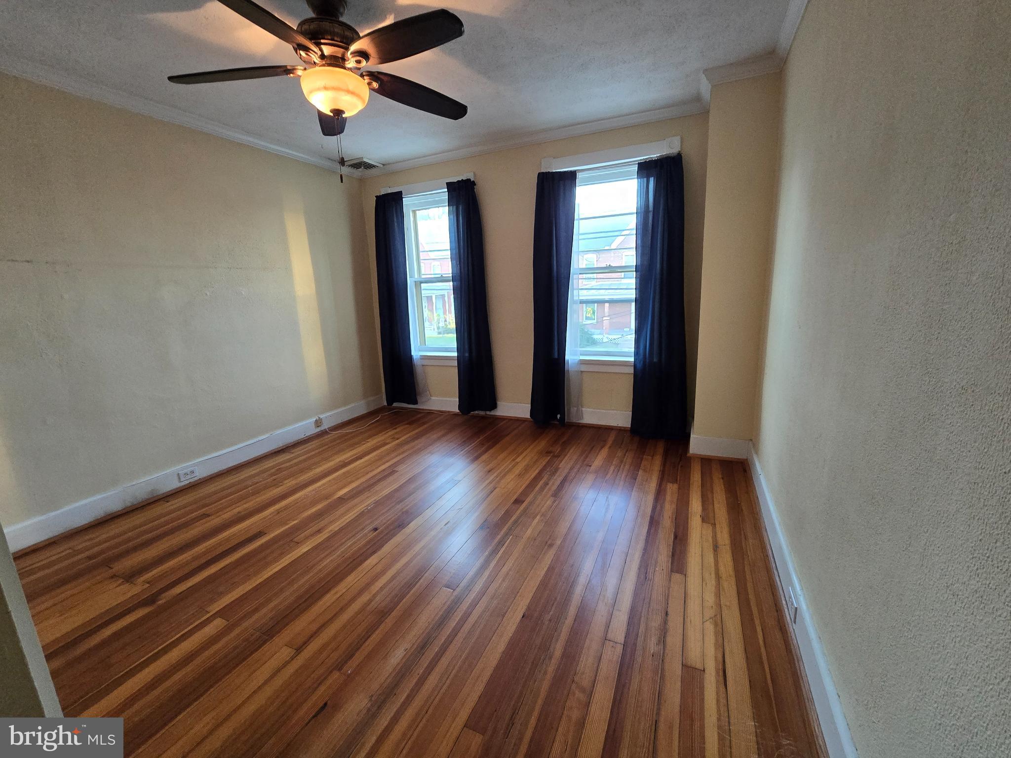 126 East 7th Street Frederick, MD 21701 - Photo 8 of 9 Bright and airy room with elegant flooring.