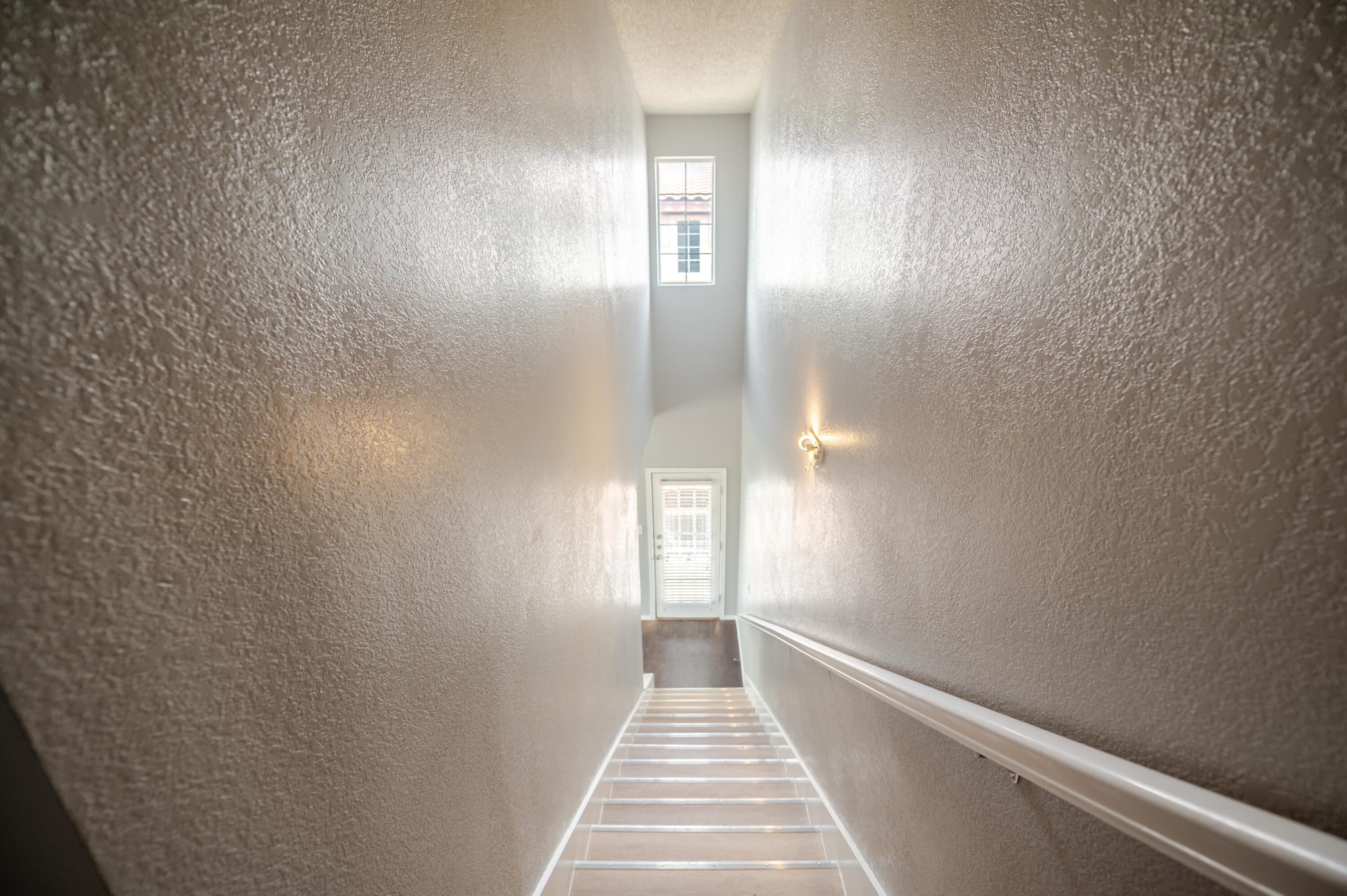 2111 Main Street, Unit 1 Lubbock, TX 79401 - Photo 26 of 36 a view of a hallway with wooden floor