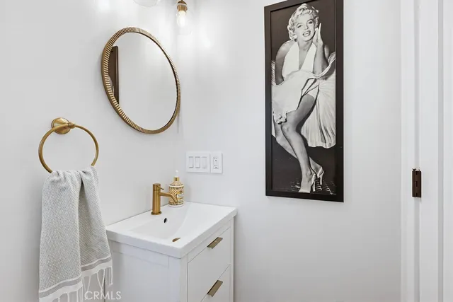 a bathroom with a toilet and a sink