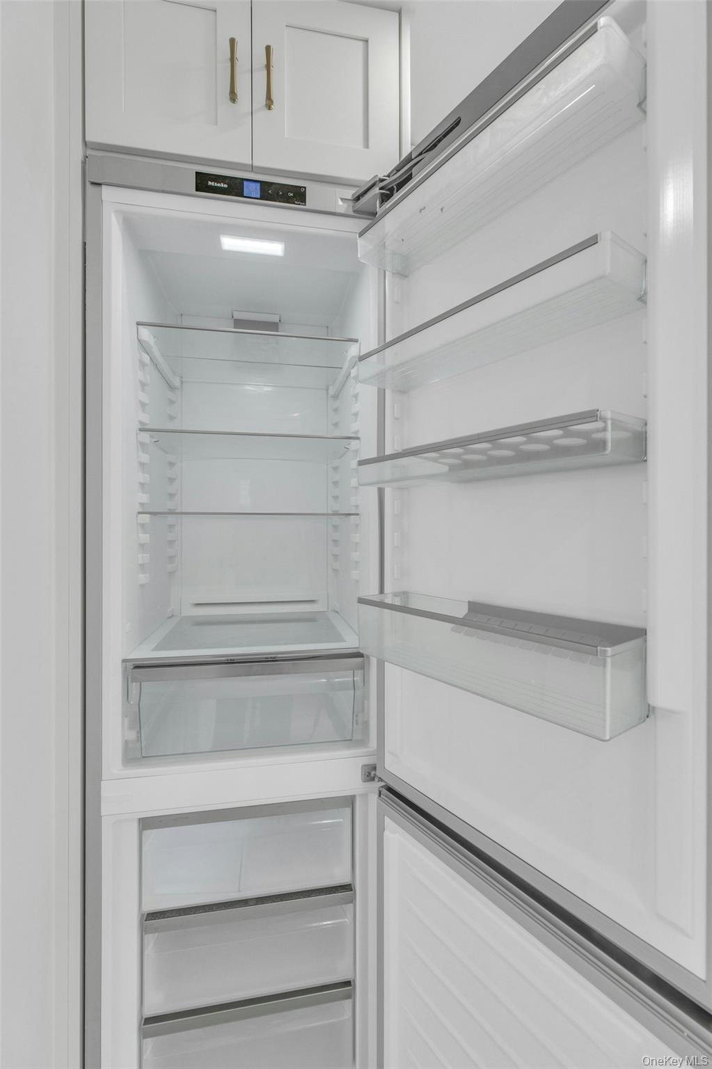 76 Green Street, Unit #2 Huntington, NY 11743 - Photo 11 of 28 a view of a store room with shelves