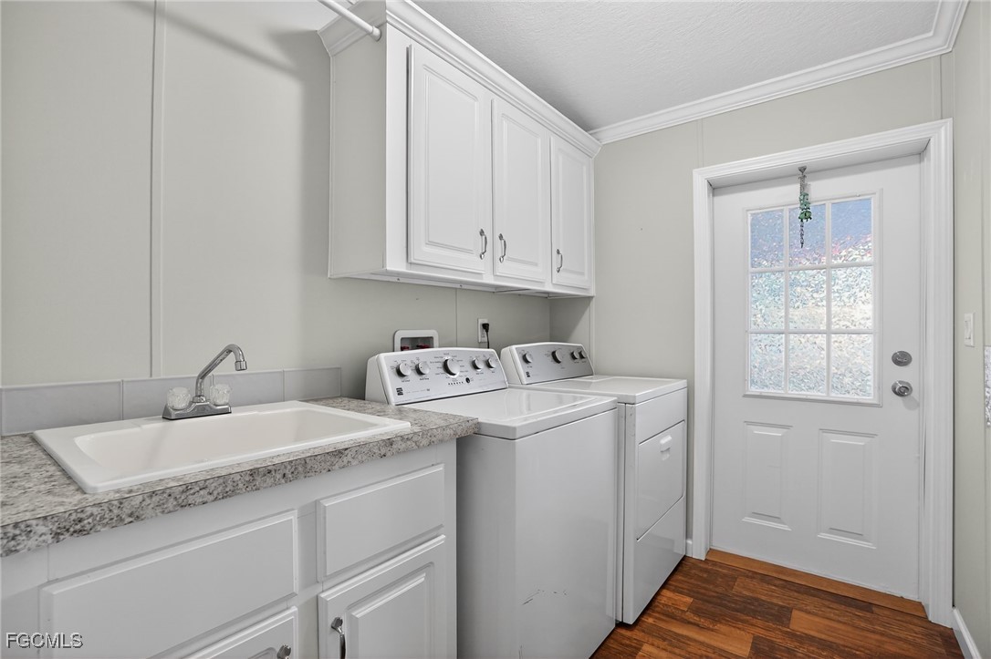 516 Menton Lane Naples, FL 34112 - Photo 15 of 34 a utility room with dryer and washer