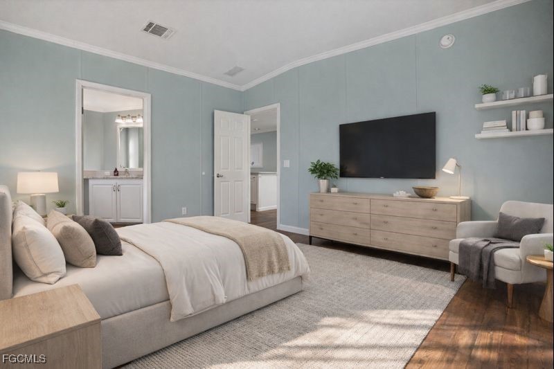 516 Menton Lane Naples, FL 34112 - Photo 22 of 34 a bedroom with a bed and a flat screen tv