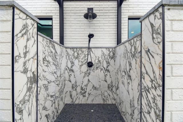 a view of a dining room with furniture wooden floor and chandelier