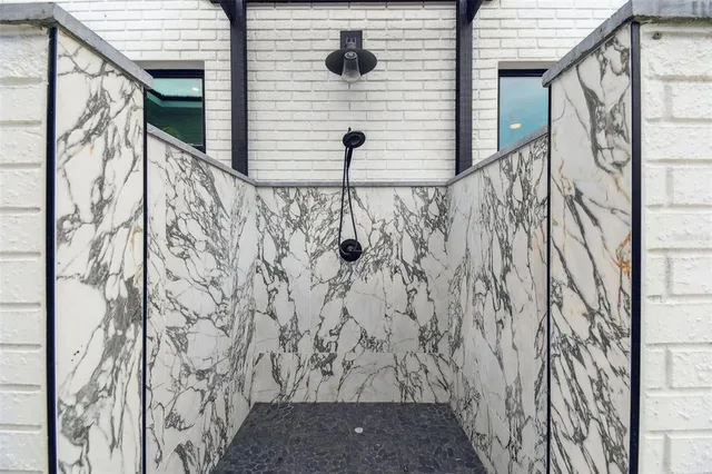 a view of a dining room with furniture wooden floor and chandelier
