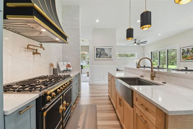 a bedroom with a bed and a television