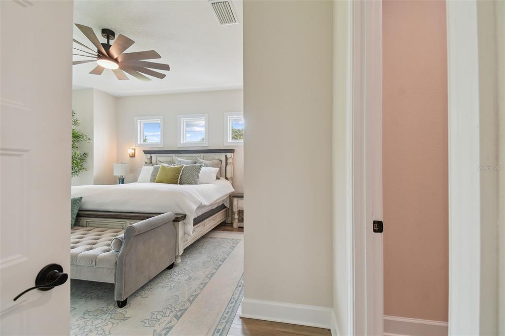 13711 Lussier Lane Spring Hill, FL 34610 - Photo 78 of 100 a bedroom with a bed and a window