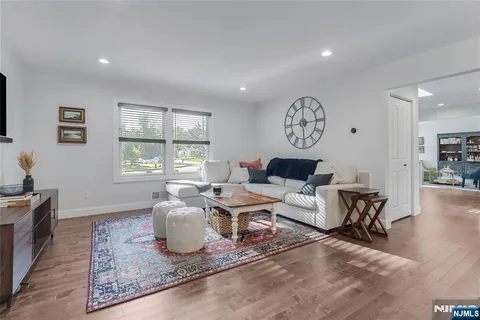 a living room with furniture and window