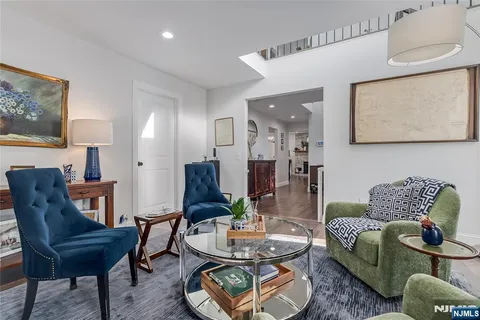 a living room with furniture and a table