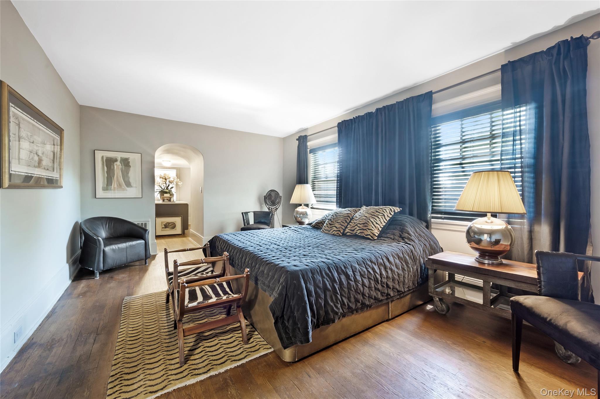 60 Aberfoyle Road New Rochelle, NY 10804 - Photo 11 of 26 a bedroom with a bed a couch and dresser