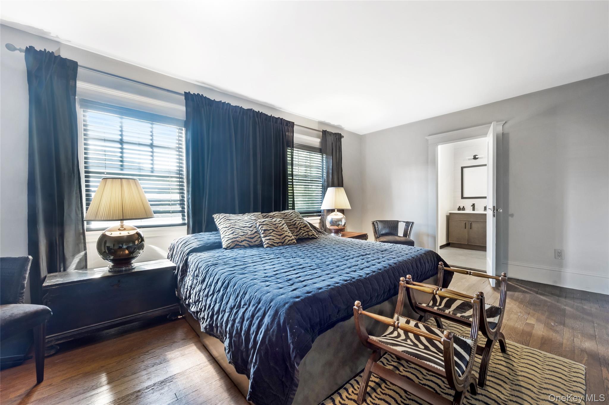 60 Aberfoyle Road New Rochelle, NY 10804 - Photo 12 of 26 a bedroom with a bed and wooden floor