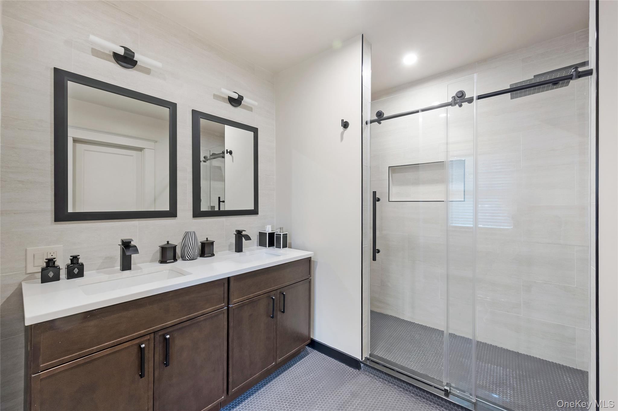 60 Aberfoyle Road New Rochelle, NY 10804 - Photo 13 of 26 a bathroom with a double vanity sink mirror and shower