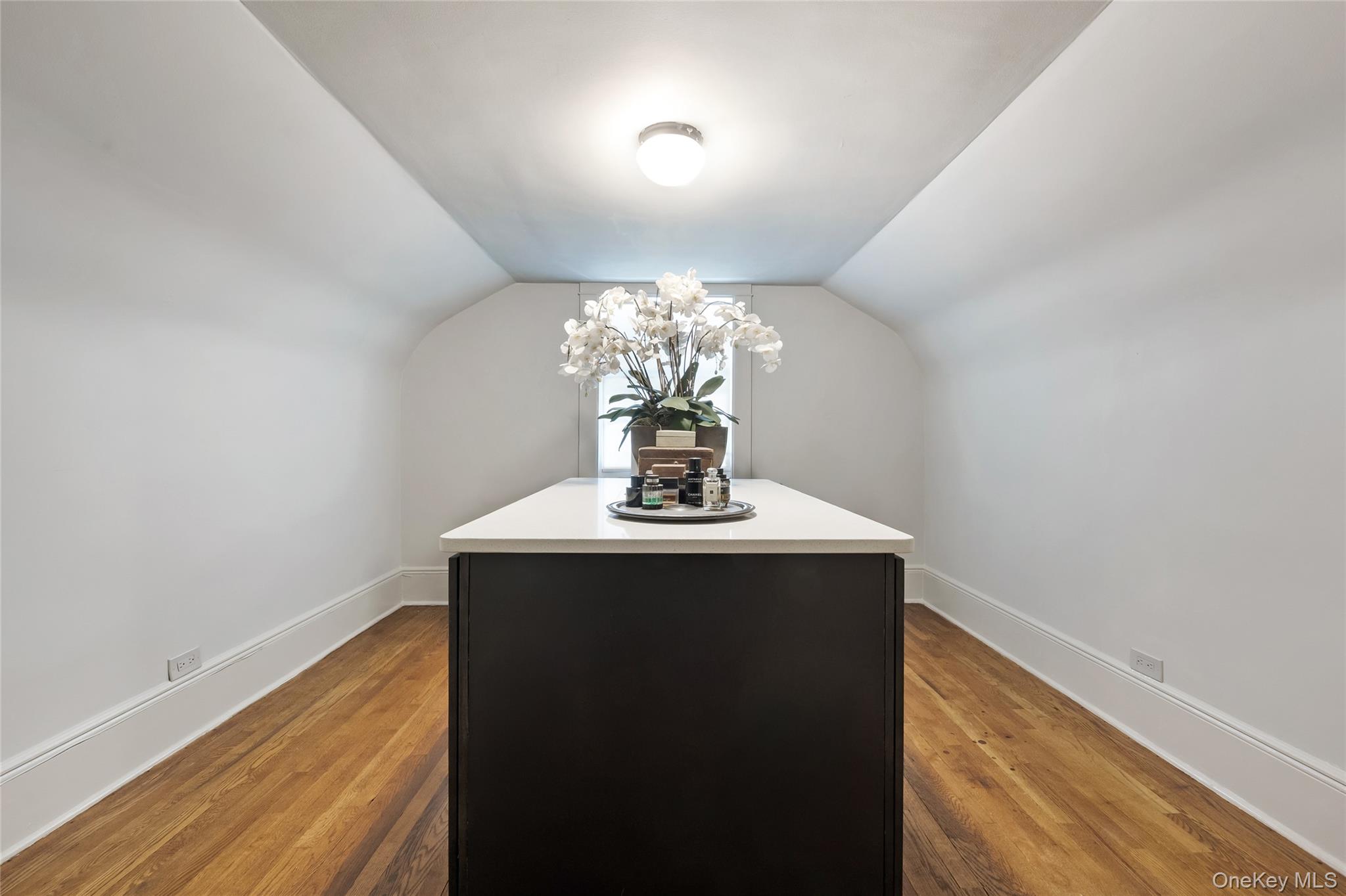 60 Aberfoyle Road New Rochelle, NY 10804 - Photo 14 of 26 a view of a hallway with a chandelier