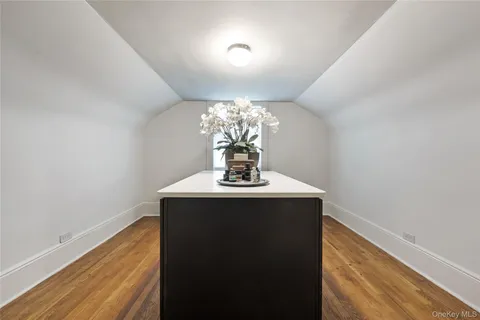 a view of a hallway with a chandelier