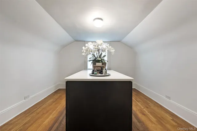 a view of a hallway with a chandelier