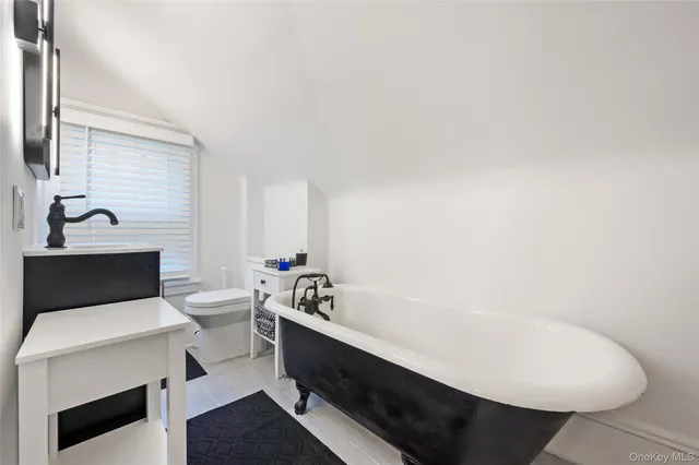 a bathroom with a sink and a toilet