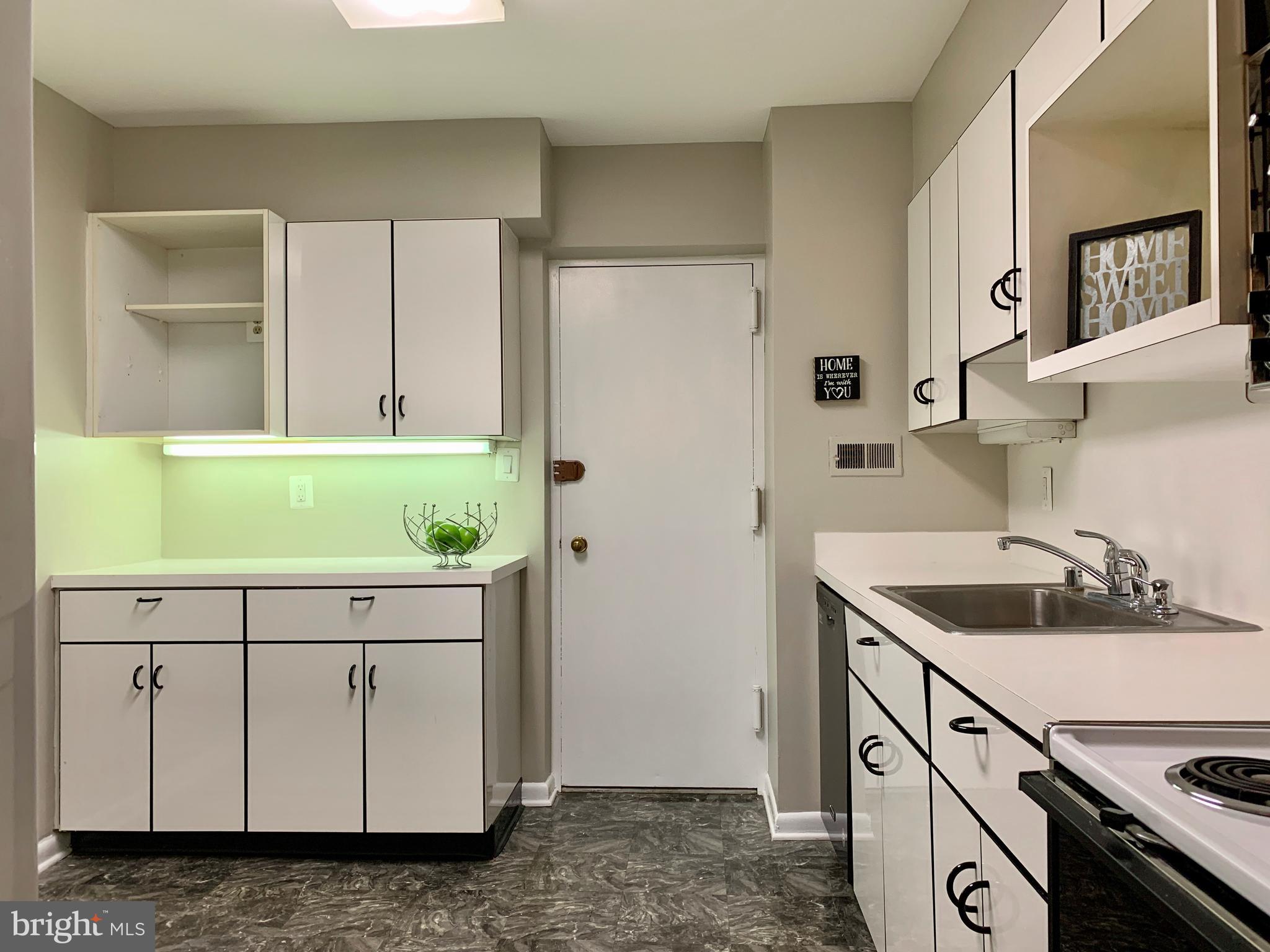 7 Slade Avenue, Unit 710 Baltimore, MD 21208 - Photo 14 of 36 Additional entrance from kitchen