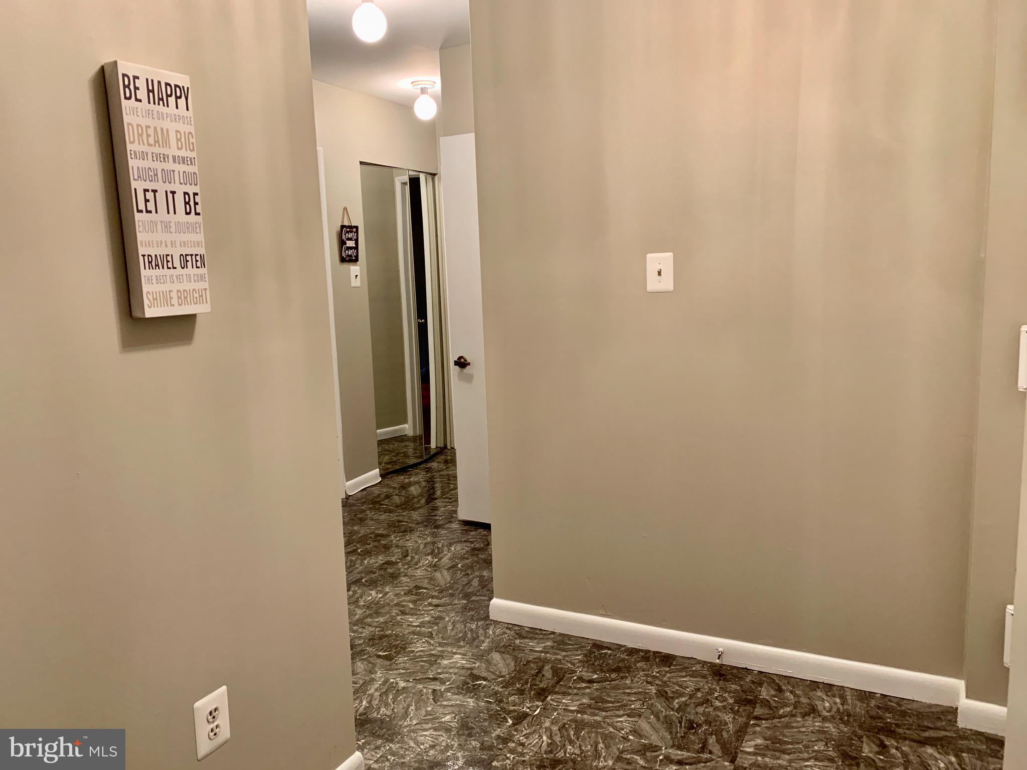 7 Slade Avenue, Unit 710 Baltimore, MD 21208 - Photo 17 of 36 Hallway to bedrooms