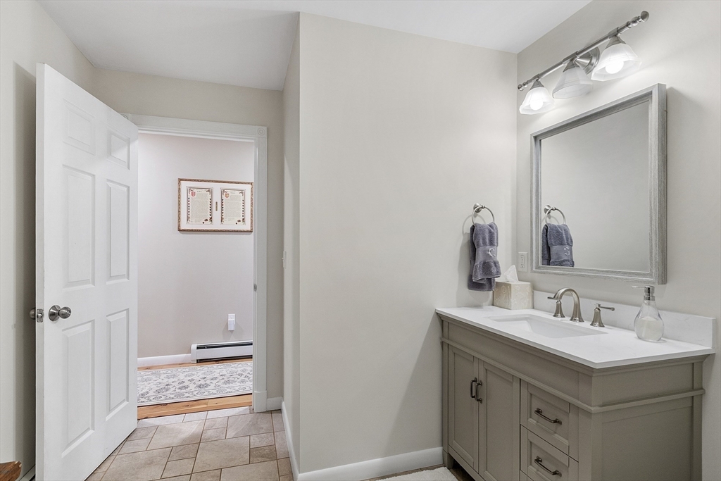 90 South Road Pepperell, MA 01463 - Photo 14 of 41 a bathroom with a sink and a mirror