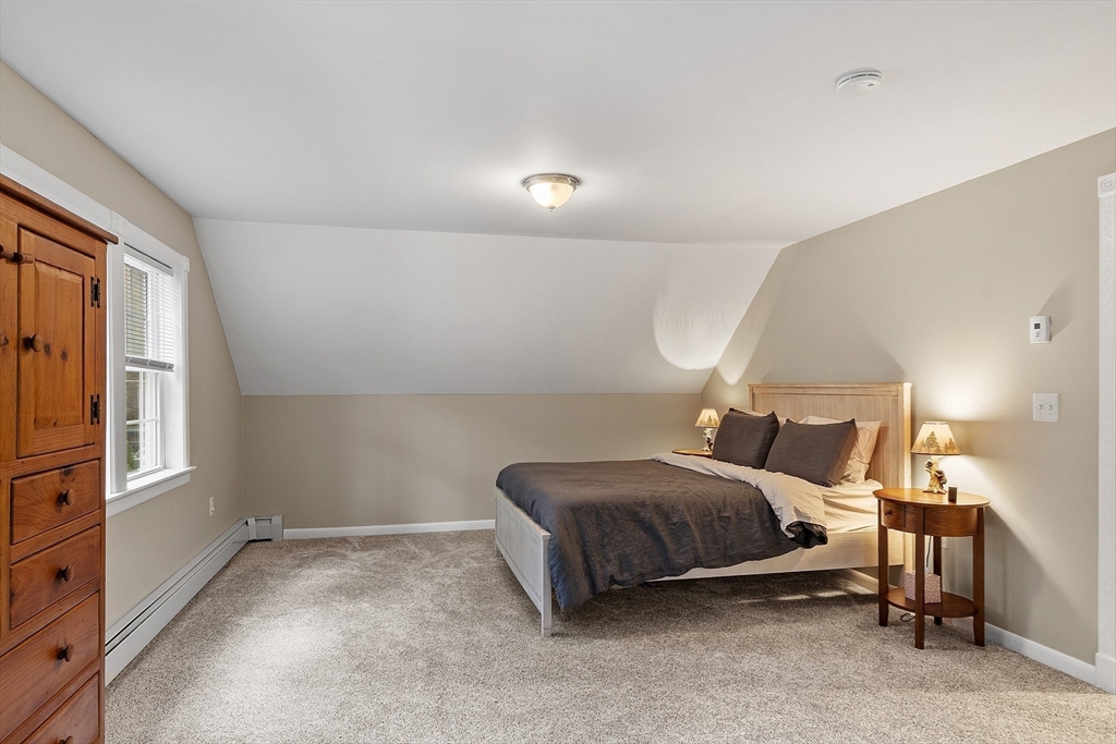90 South Road Pepperell, MA 01463 - Photo 28 of 41 a living room with a bed furniture and a window