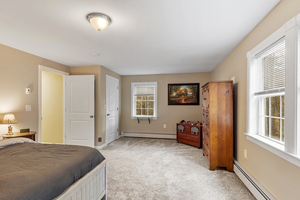 90 South Road Pepperell, MA 01463 - Photo 29 of 41 a bedroom with a bed and a window