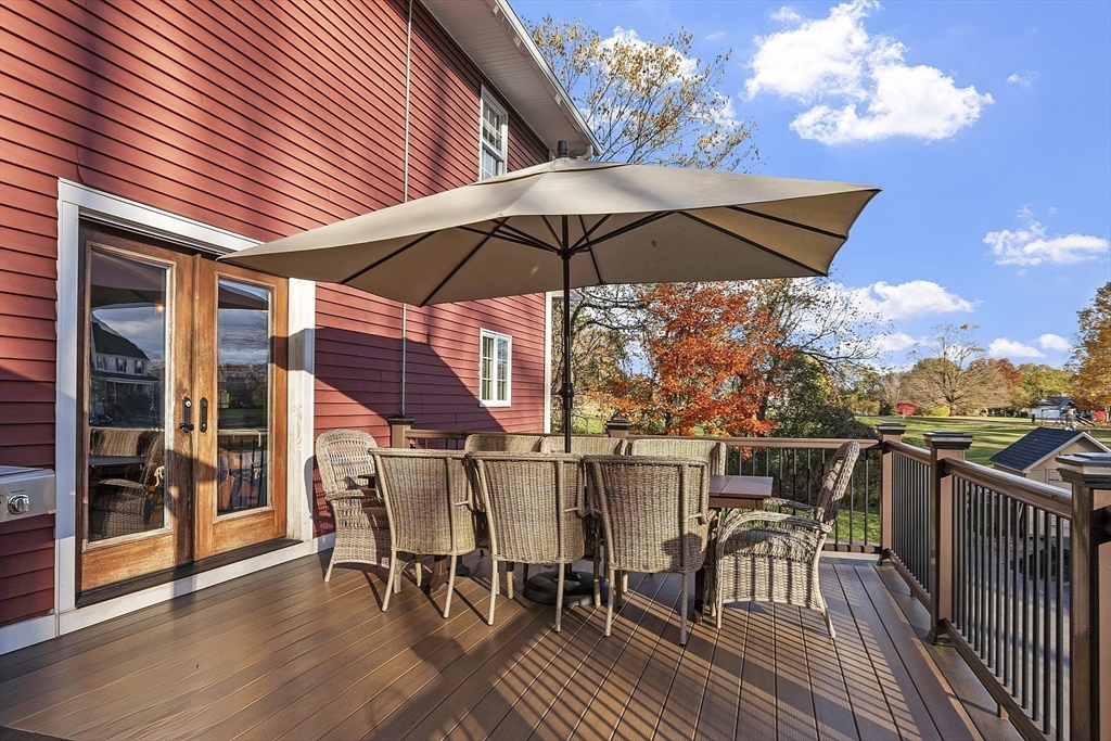 90 South Road Pepperell, MA 01463 - Photo 30 of 41 a view of a roof deck with table and chairs
