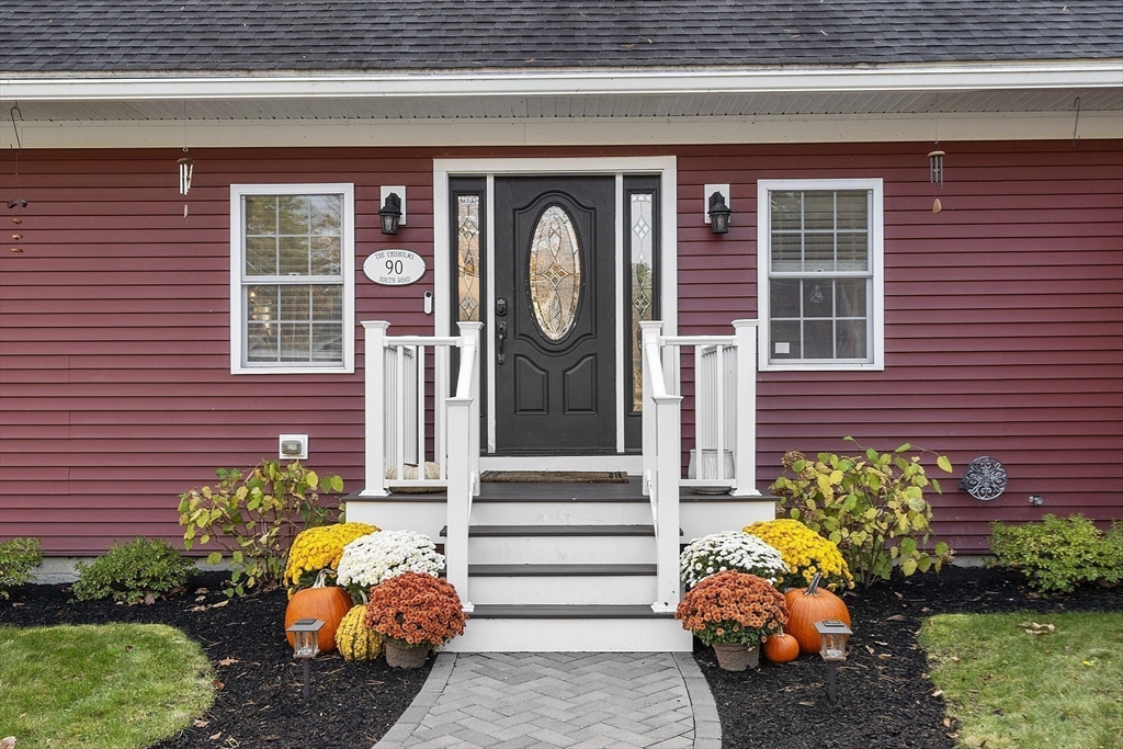 90 South Road Pepperell, MA 01463 - Photo 3 of 41 a front view of a house with a garden
