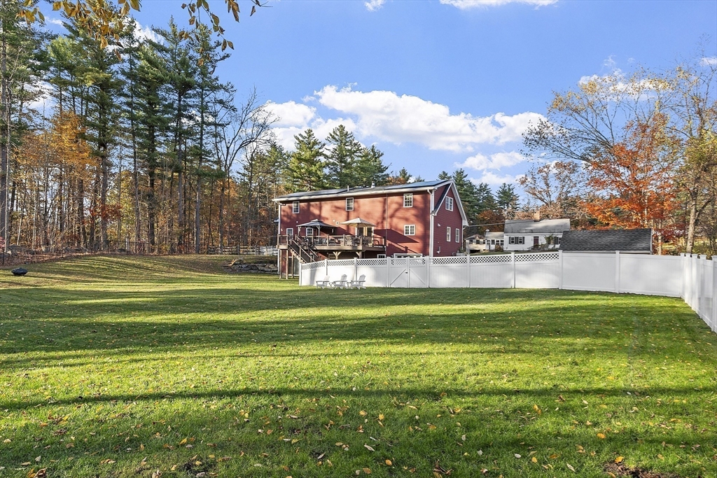 90 South Road Pepperell, MA 01463 - Photo 36 of 41 a view of a swimming pool with a yard
