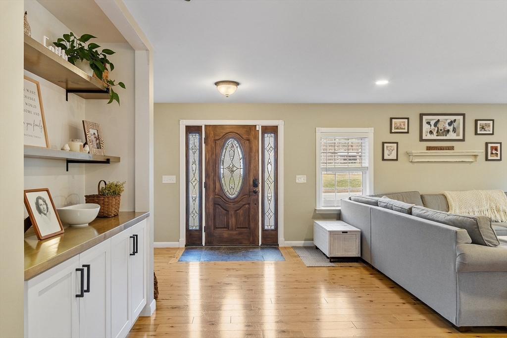 90 South Road Pepperell, MA 01463 - Photo 4 of 41 a living room with furniture and a window