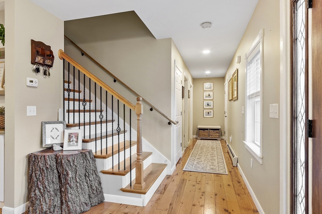 90 South Road Pepperell, MA 01463 - Photo 5 of 41 a view of entryway with wooden floor
