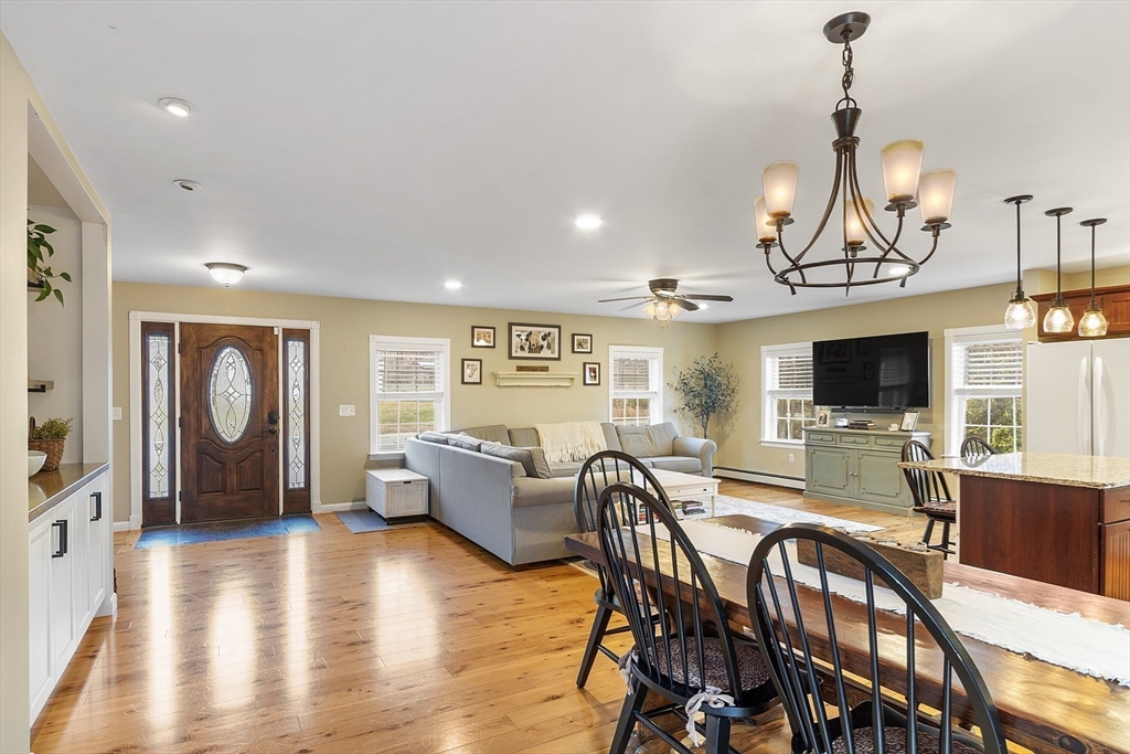 90 South Road Pepperell, MA 01463 - Photo 8 of 41 a view of a dining room with furniture window and wooden floor