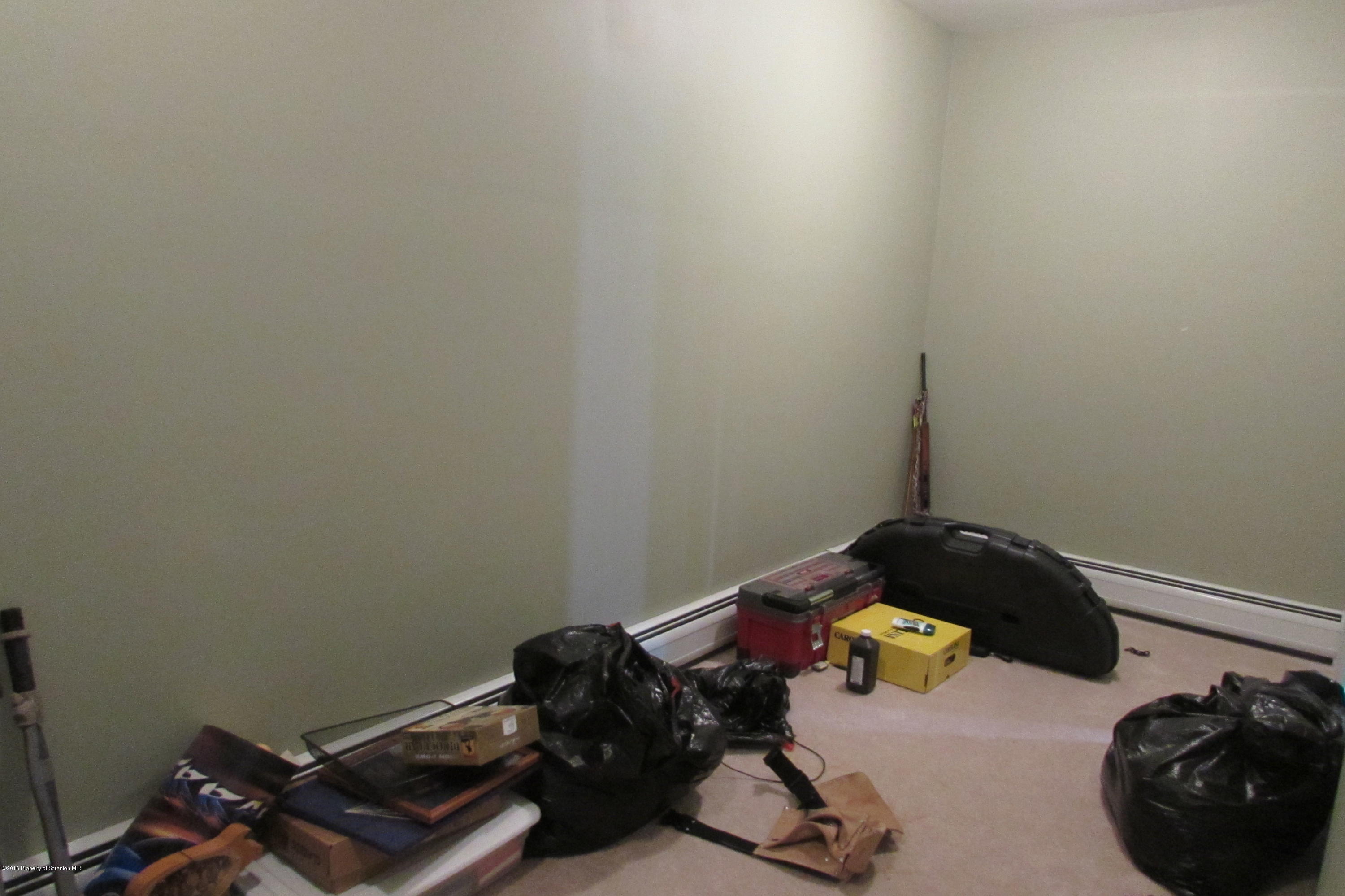 637 Craig Hill Road Meshoppen, PA 18630 - Photo 12 of 22 a room with a closet and wooden floor