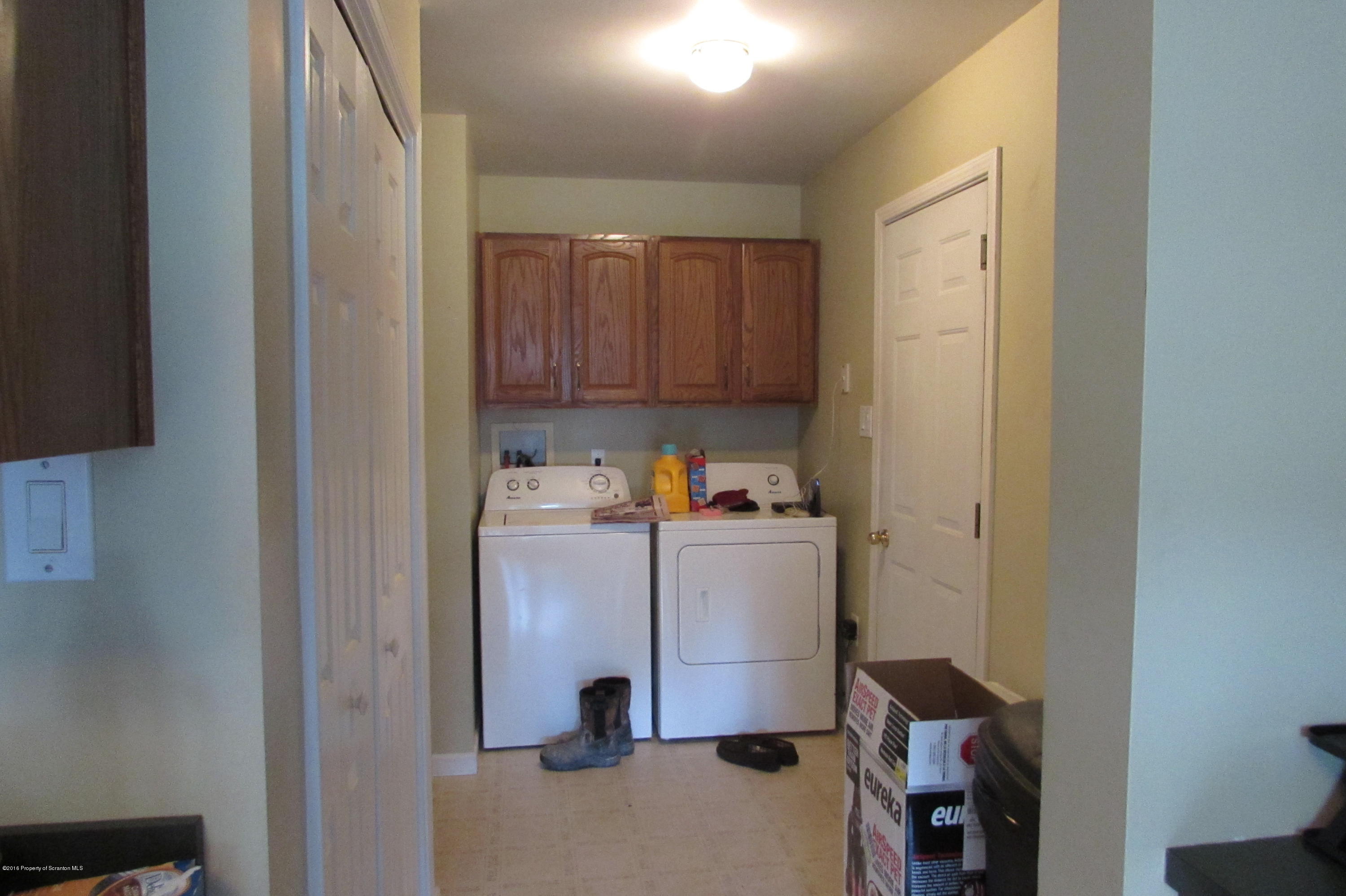637 Craig Hill Road Meshoppen, PA 18630 - Photo 13 of 22 a room with storage and utility