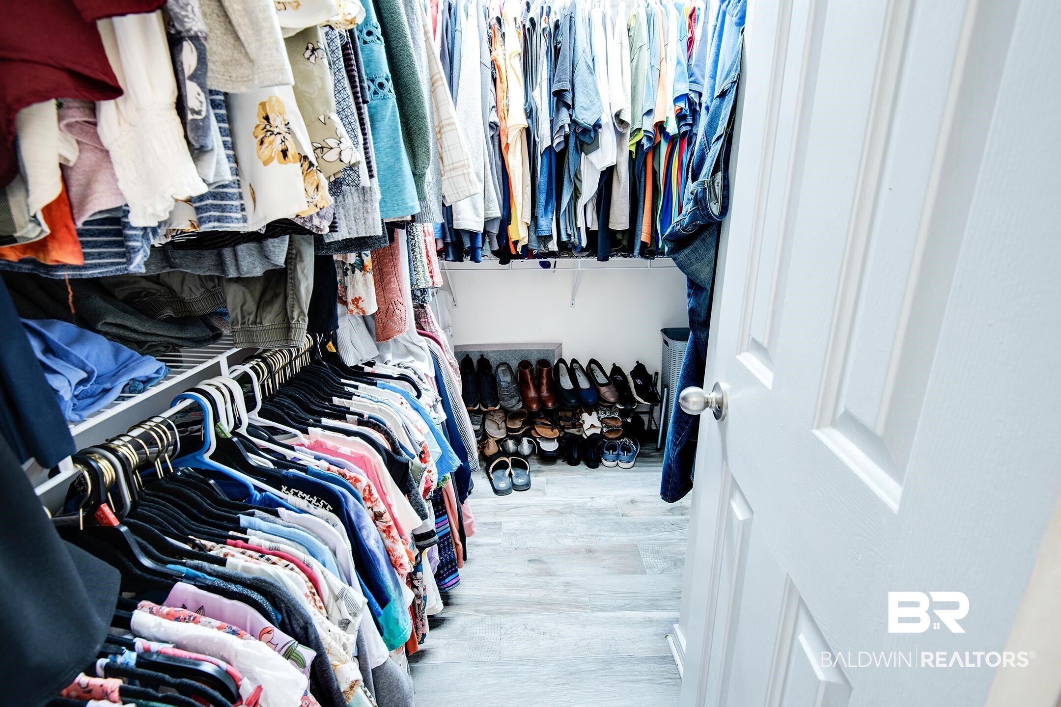 10093 Willis Road Foley, AL 36535 - Photo 13 of 33 Walk in closet with light wood-style flooring