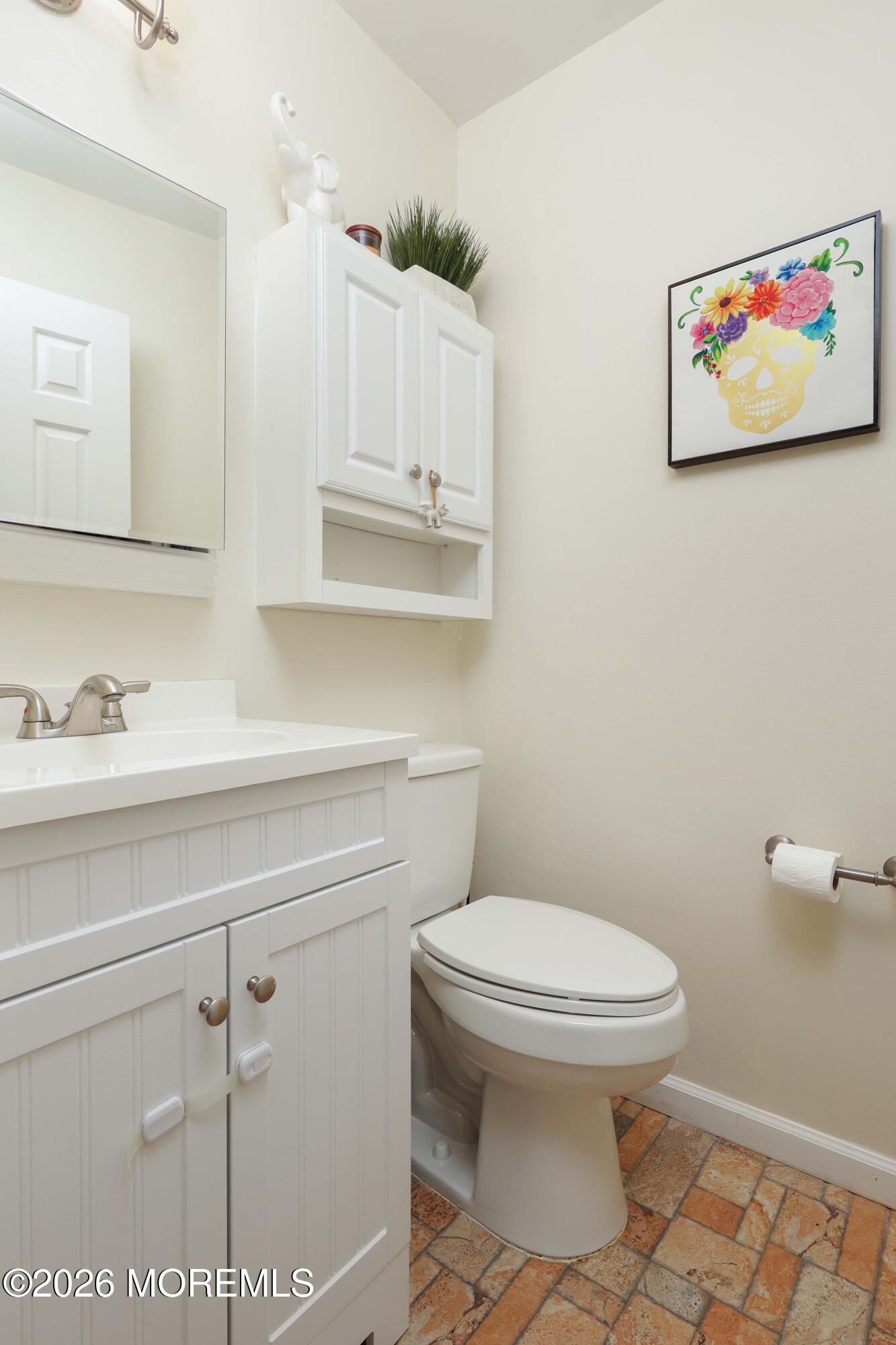 27 Jennifer Drive Howell, NJ 07731 - Photo 11 of 27 a bathroom with a toilet and a sink