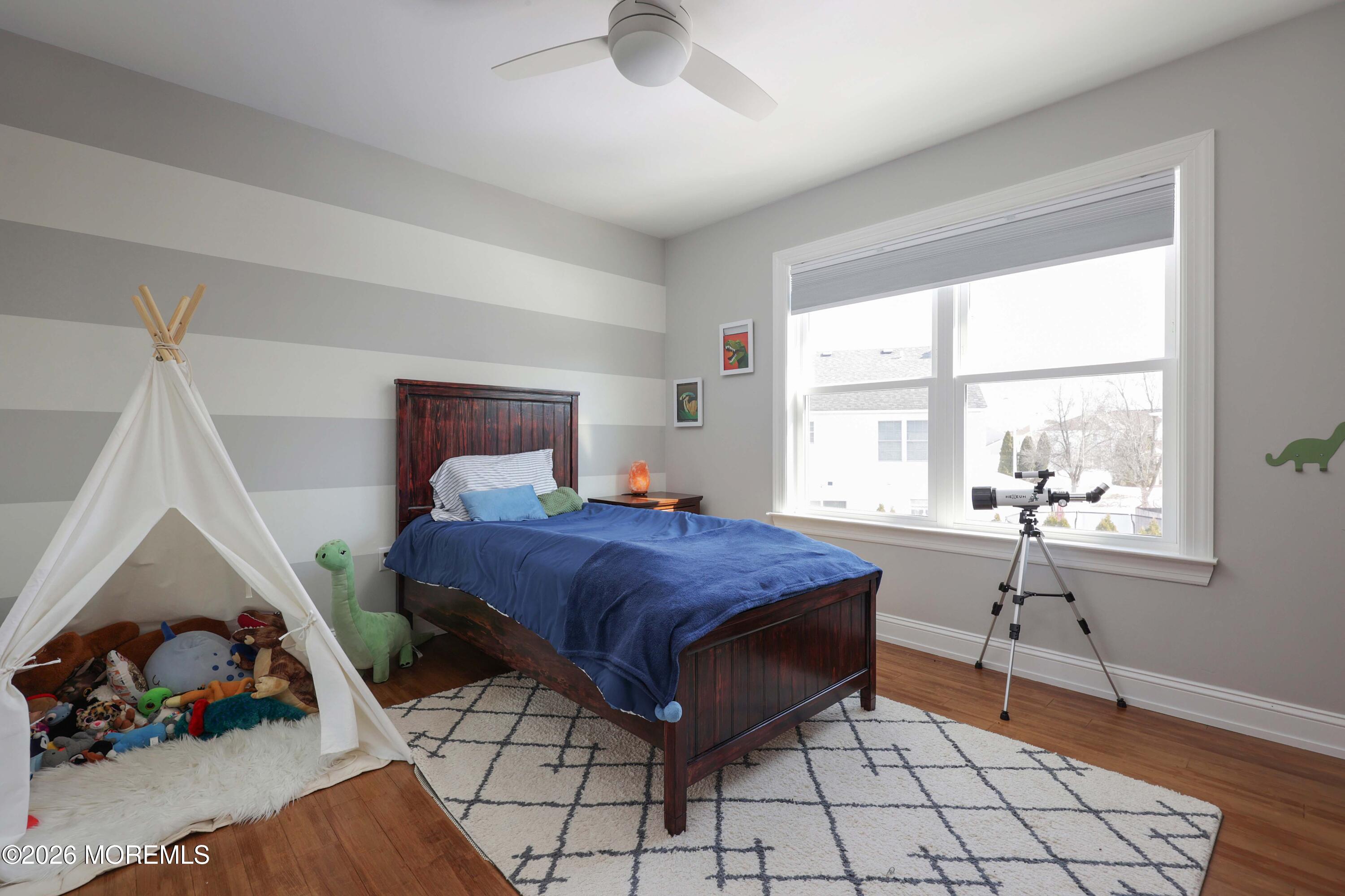 27 Jennifer Drive Howell, NJ 07731 - Photo 17 of 27 a bedroom with a bed and a window
