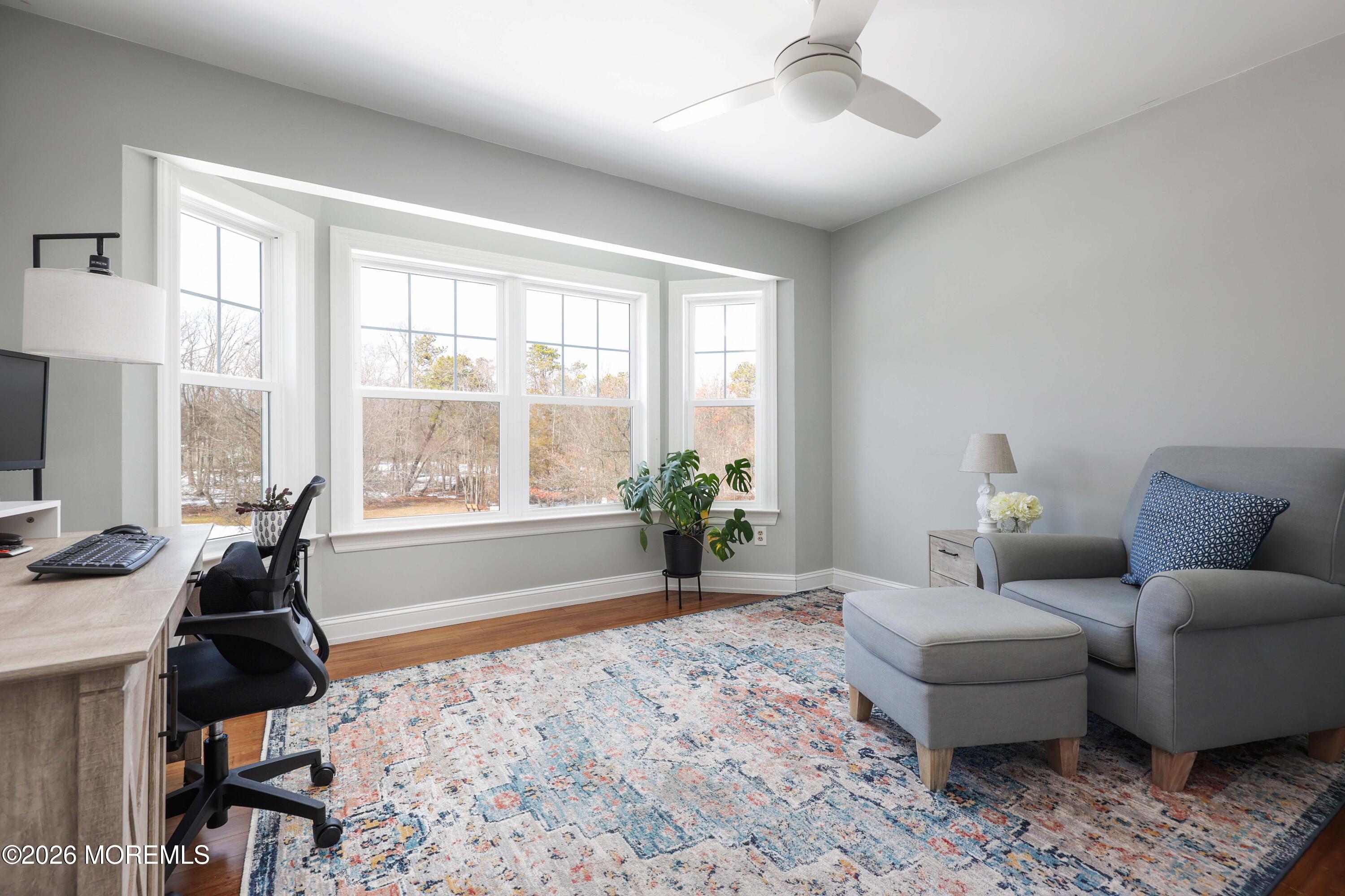 27 Jennifer Drive Howell, NJ 07731 - Photo 20 of 27 a living room with furniture and a large window
