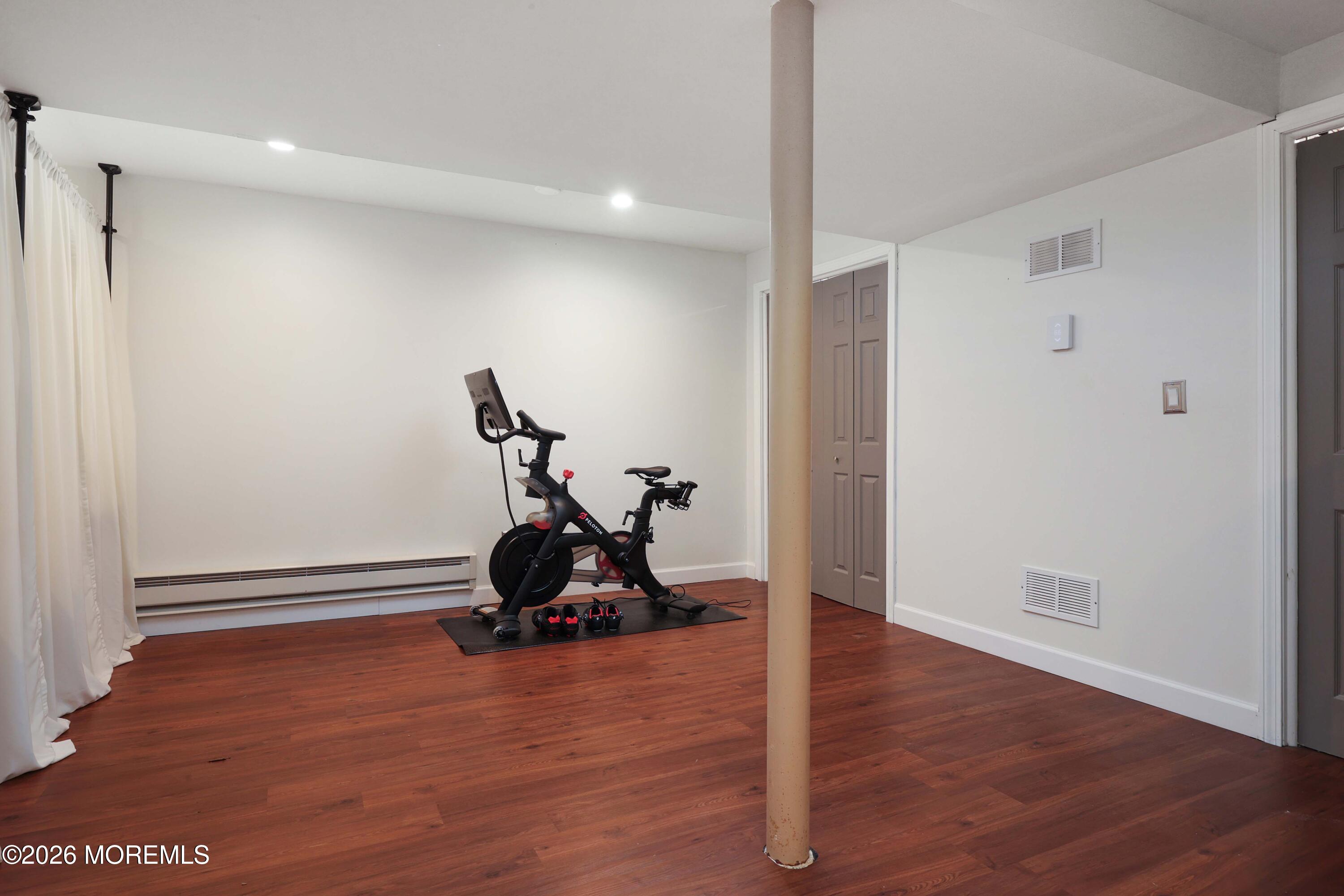 27 Jennifer Drive Howell, NJ 07731 - Photo 24 of 27 a view of a room with gym equipment