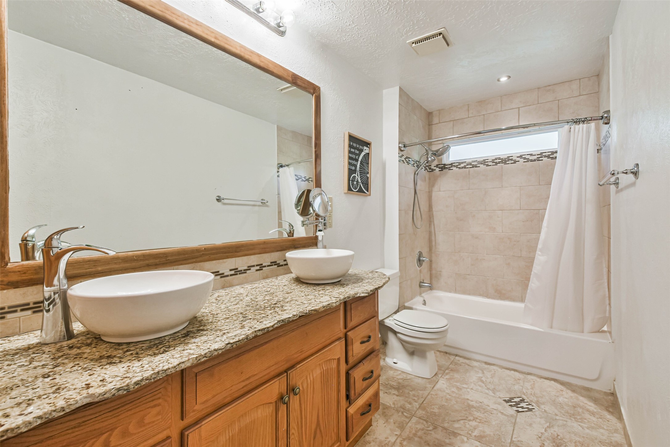 12 Coralberry Road Spring, TX 77381 - Photo 24 of 45 a bathroom with a granite countertop sink toilet and shower