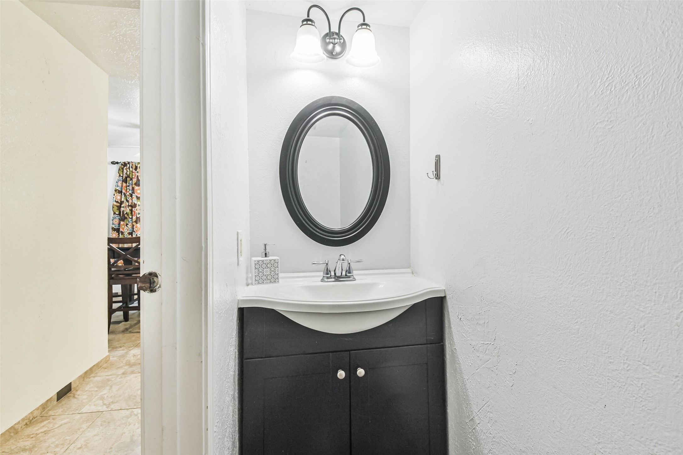 12 Coralberry Road Spring, TX 77381 - Photo 28 of 45 a sink with a mirror