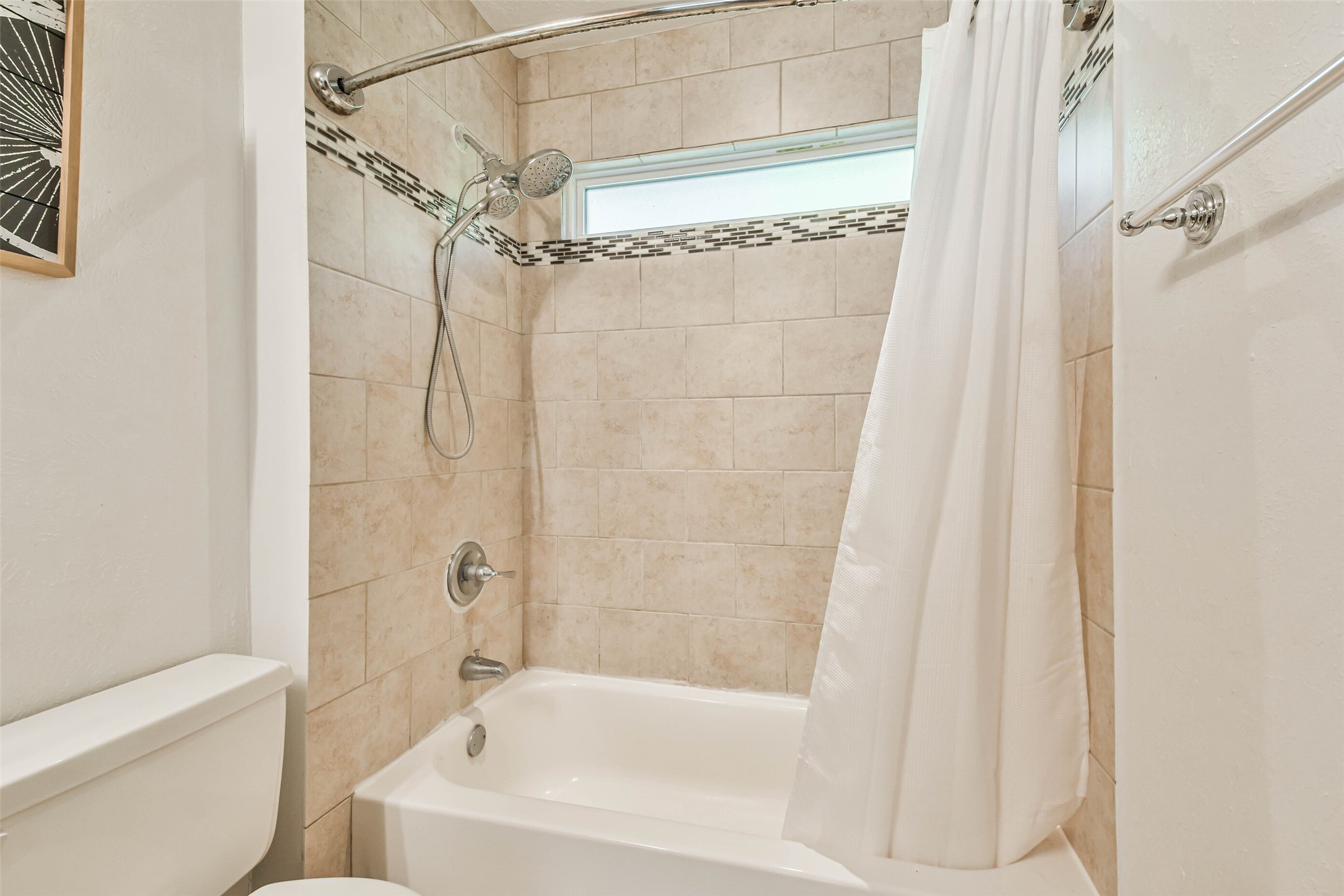12 Coralberry Road Spring, TX 77381 - Photo 35 of 45 a bathroom with a shower and a bath tub