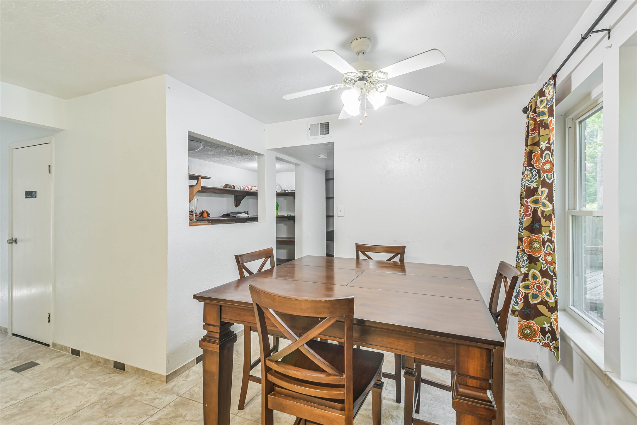 12 Coralberry Road Spring, TX 77381 - Photo 10 of 45 a view of a dining room with furniture and wooden floor